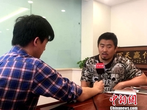 图为中新网记者专访徐晓冬。中新网记者 让宝奎 摄