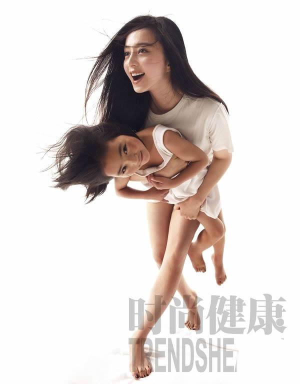 范冰冰30岁生日拍公益写真抱藏族女孩登封面_图-4