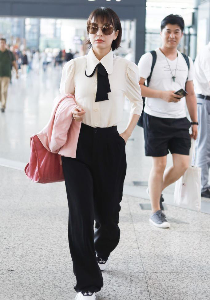 吴昕现身机场打扮干练不失小女人优雅_图-4